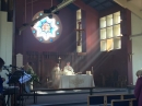 The sun shining on the altar during the Eucharistic Prayer.